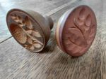 2 small antique butter press moulds