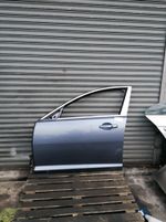 JAGUAR XF X250 BARE DOOR LEFT SIDE FRONT IN AZURE BLUE JBC2038A SALOON 2008