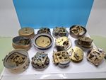 collection of vintage mechanical clock movements, primarily from 1950s and...