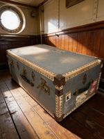 Vintage travel trunk with old labels fab coffee table / storage clean inside