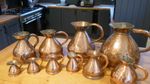 Victorian harlequin set of 10 Copper Measuring Jugs 1/4 Gill  2 Gallons