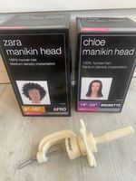2 hair-dressing manikin heads and clamp. Zara and Chloe. Human hair