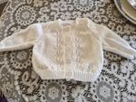 Brand New Hand Knitted 4ply White Cardigan With Patterned Front.