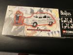 Corgi Classics the Beatles Collection Newspaper Taxi Figure & Car