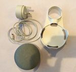 Google Home Mini Smart Speaker Grey and plug mount