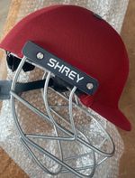 shrey cricket helemt in maroon. Junior size, new and in box
