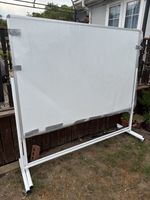 Mobile Magnetic Whiteboard Stands with Locking Casters and Stability Bars.
