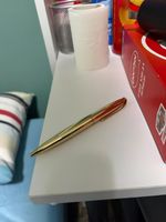 used pen in the color gold