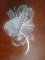 A Small Grey Fascinator with Feathers