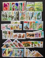 DINOSAURS, PREHISTORIC ANIMALS collection of 73 different in 12 complete sets