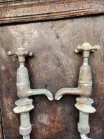 Pair of antique Victorian unpolised brass bath or sink taps