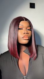 Synthetic Burgundy Straight Bob Wig – Sleek Middle Part, Stylish & Easy to Wear.
