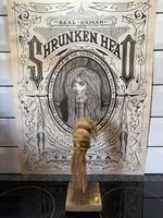 Shrunken head hand made ecuador, animal skin and hair on stand Tsantsa No6a