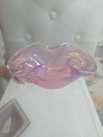 Vintage Italian Murano glass bowl featuring an iridescent finish with pink