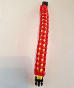 Red & Yellow Nylon Paracord Bracelet w/ Black Buckle 21cm