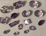 BEAUTIFULLY SWISS CUT SEMI-PRECIOUS AFRICAN AMETHYST STONES IN VARIOUS SHAPES.