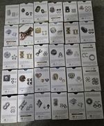 30 Huzzle Puzzles,ive  opened 3,the rest are sealed and all Brand New.