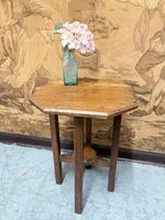 Heavy Art Deco occasional table with square legs and undertier