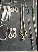 silver toned diamante necklaces, bracelets, earrings