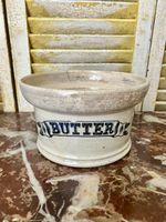 An antique ironstone butter dish
