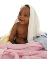 Pomelo Baby 100% Cashmere Vintage Knit Blanket in Blue, Pink and Yellow.