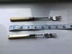 2 x VINTAGE PICKLE FORKS. One  believed to be silver plate. Only one has marking