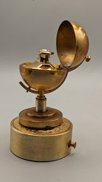 Vintage 1950s COLIBRI Golden Globe Tabletop Musical Lighter. Rare