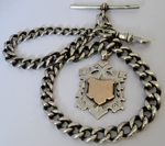 Antique solid silver pocket watch albert chain w/ silver & gold fob medal