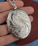 VINTAGE REPOUSSE PATTERN double-sided LOCKET 2"oval LARGE necklace SILVER PLATED