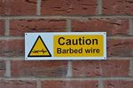 CAUTION BARBED WIRE plastic sign or sticker 300mm x 100mm fence wall security