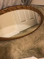 a vintage french gilt framed mirrior elegent scroll engraving light honey grain