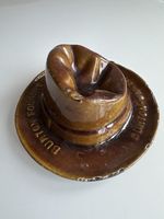 Vintage Metal "Burton Foundry" designed to look like a brown, crumpled hat.