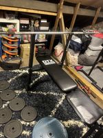 a complete gym system with a multitude of machines and weights