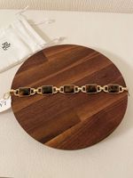 Ralph Lauren Gold Tone Tortoise & Crystal Bracelet, original dust bag included