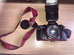 A Ricoh X-RAY-20so Camera, Vivitar Auto thyristor 550 Fd Flash, with camera case