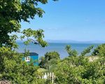 Custom Built Shepherd's Hut 30 Metres from Secluded Beach and in own Garden