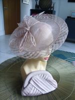 smart ladies very pale dusky peachy pink wedding hatinator