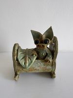 Yare designs pottery dragon, Dragon in bed By Potter Sue Turner