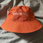 Trainspotting official 30th anniversary promo orange bucket hat. Choose life.