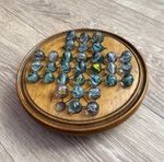 Antique wooden solitaire board. Believed to date from 19th century.. 