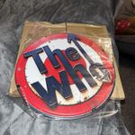 The WHO Mod 20cm diameter metal sign