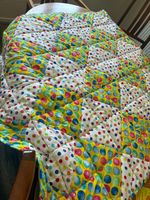 Hand made fun spotty child's quilt or play mat, cotton with polyester filling
