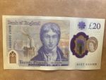 Rare £20 note with unique serial number 000069