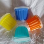 Four Vintage Tupperware Individual Jelly Moulds with Lids