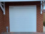 White Single Aluminium Insulated Electric Roller Garage door made to size