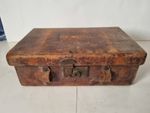 Vintage brown leather shotgun cartridge case.