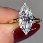 14x7 mm Marquise Cut Moissanite Hidden Halo Engagement Ring In 9K Two-Tone Gold