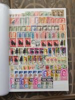 Mainly Rwanda stamps some San Marino Etc  stockbook Estimate 2500-3000 Stamps