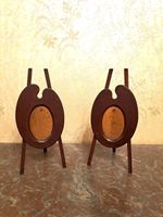Antique pair of artist palettes on easels as photo frames