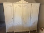 CARVED OAK FOUR DOOR ARMOIRE/WARDROBE CIRCA 1940